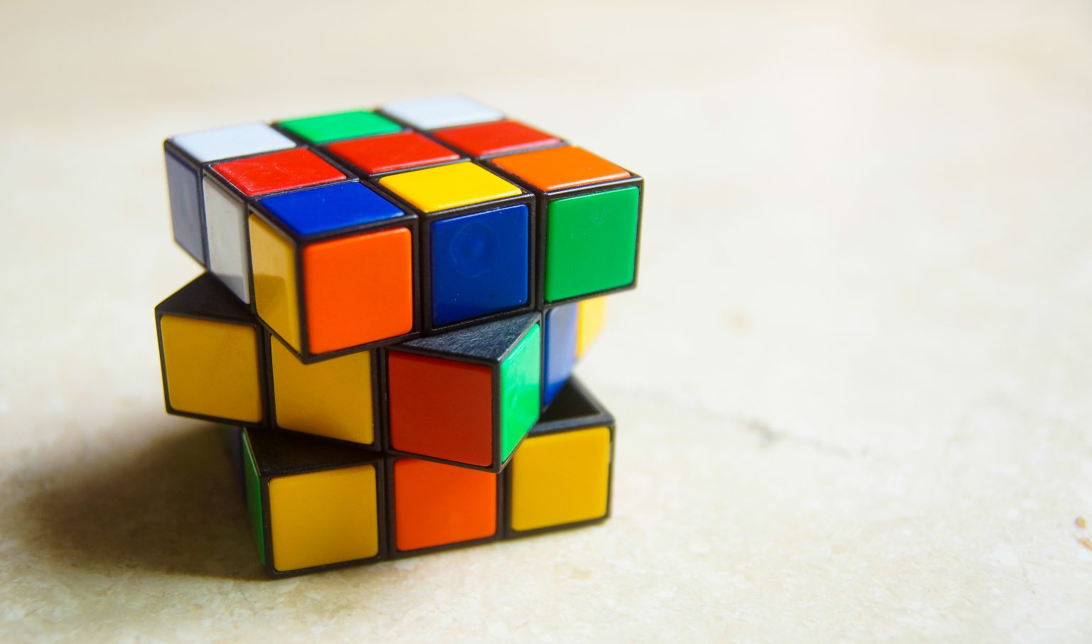 Rubik,Cube,Stand,Isolated,With,Unsolving,Shape.